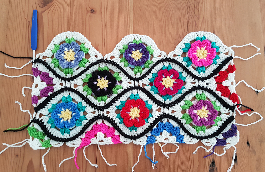 Moroccan Garden: Free crochet pattern for a floral tile with halves and quarter pieces for squaring off. Make blankets, throws, afghans, scarves, bags, shawls - anything!
